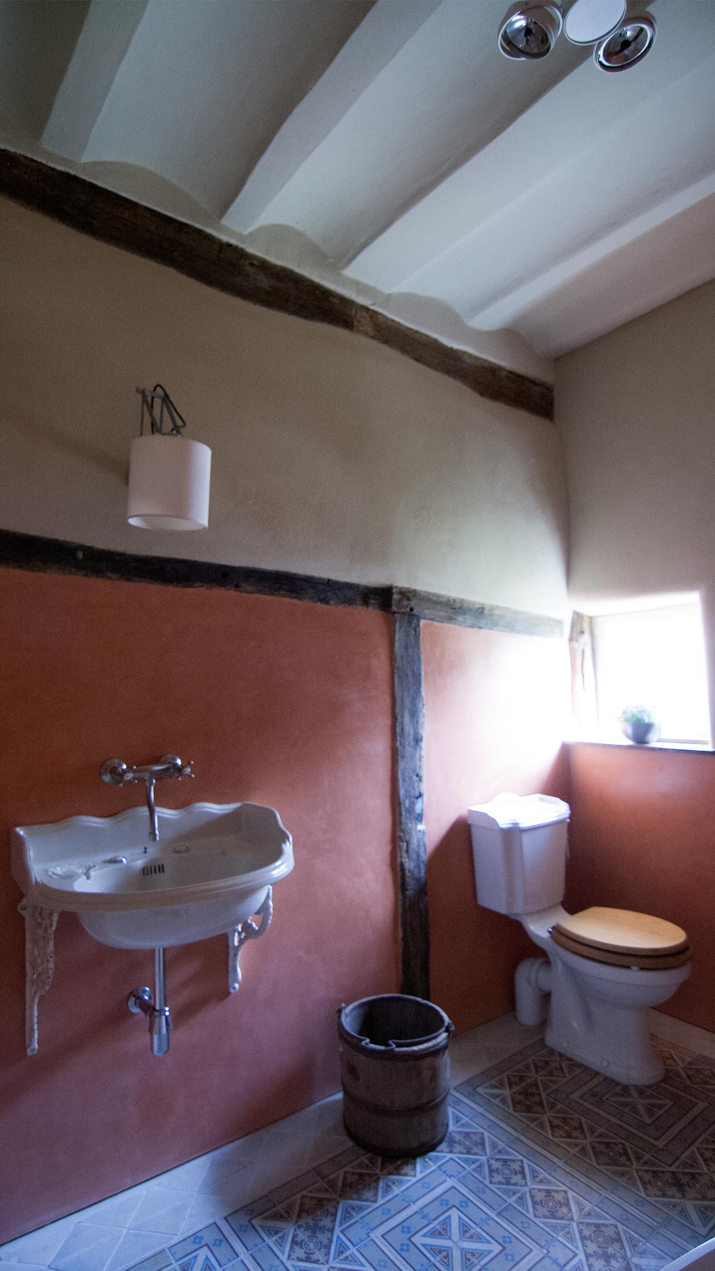 Residential - Coral red bathroom, Toilet and sink