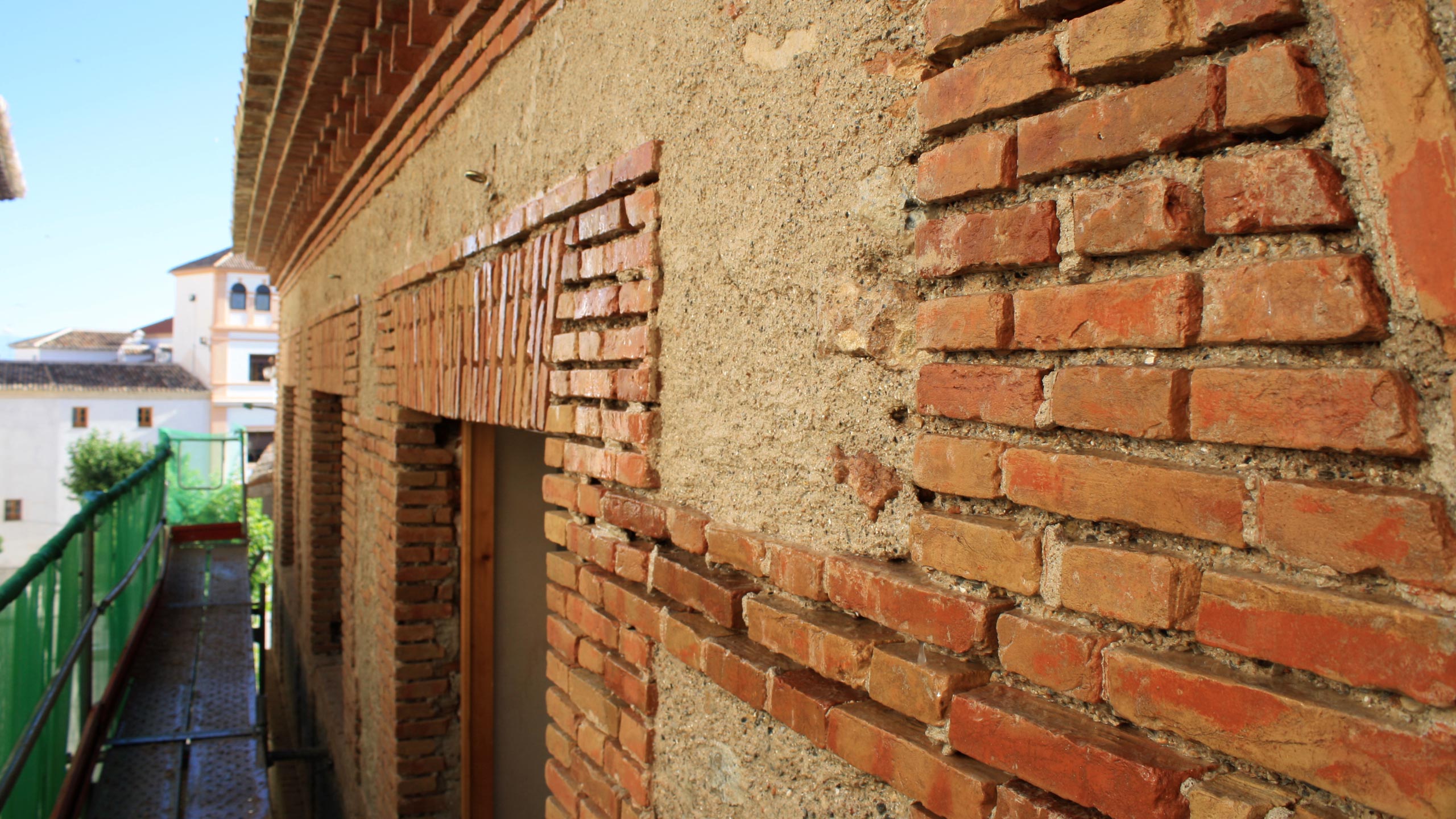 Commercial - Archeological Museum, Uncovered brick and base plaster